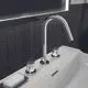 Waschtischarmatur aus Chrom von Ideal Standard mit einem auslaufenden Wasserhahn und zwei Hebeln zur Steuerung von Temperatur und Durchfluss.